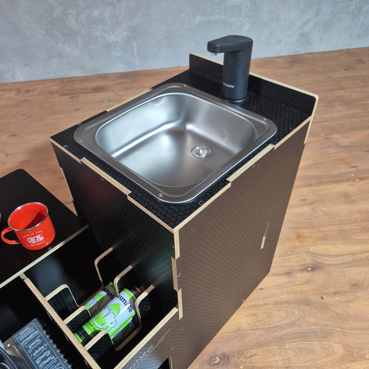 Slide-out kitchen and sink unit